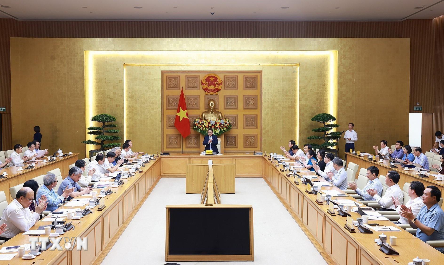 Thủ tướng Phạm Minh Chính chủ trì cuộc họp với Hội đồng Tư vấn chính sách về phát triển kinh tế tư nhân chiều 8/5/2025. (Ảnh: Dương Giang/TTXVN) ttxvn-thu-tuong-kinh-te-tu-nhan-1.jpg